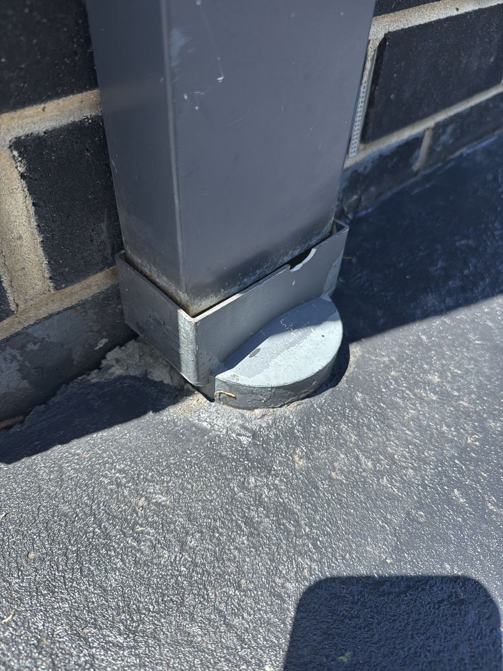 Downpipe not seated in its stormwater joint, spilling water against the wall, found during a pre-purchase inspection in Officer