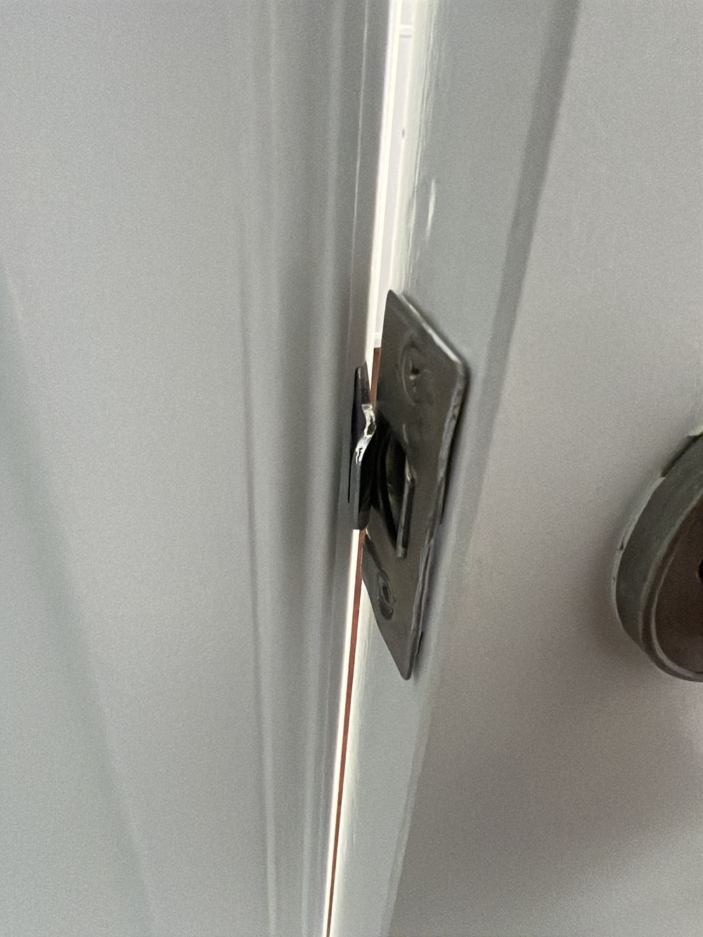 Doors binding in their frames, needing adjustment to open and close freely, found during a pre-purchase inspection in Officer