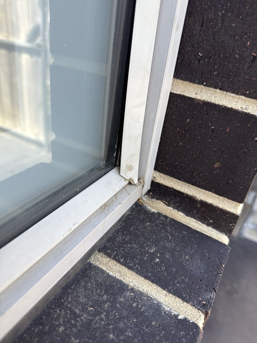 Minor damage and wear to a window frame, found during a pre-purchase inspection in Officer